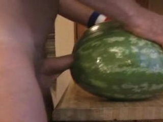 Hot guy fucking a watermelon in his kitchen in this video !